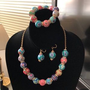 One of a kind set, colorful clay beads/gold tone.